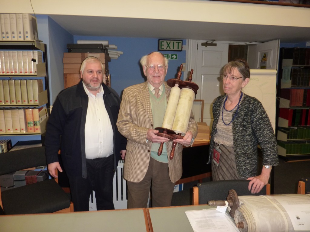 The Scroll being returned to Leslie Lipert by Bernard Benarroch , Sofer in the presence of Angel Broome, Museum Librarian  - December 2014